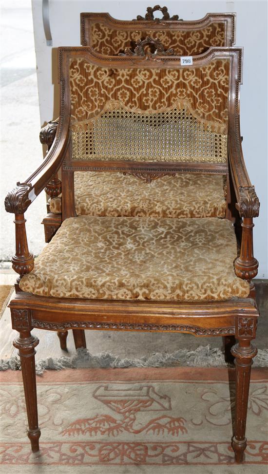 Pair of Louis Phillipe walnut caned back elbow chairs